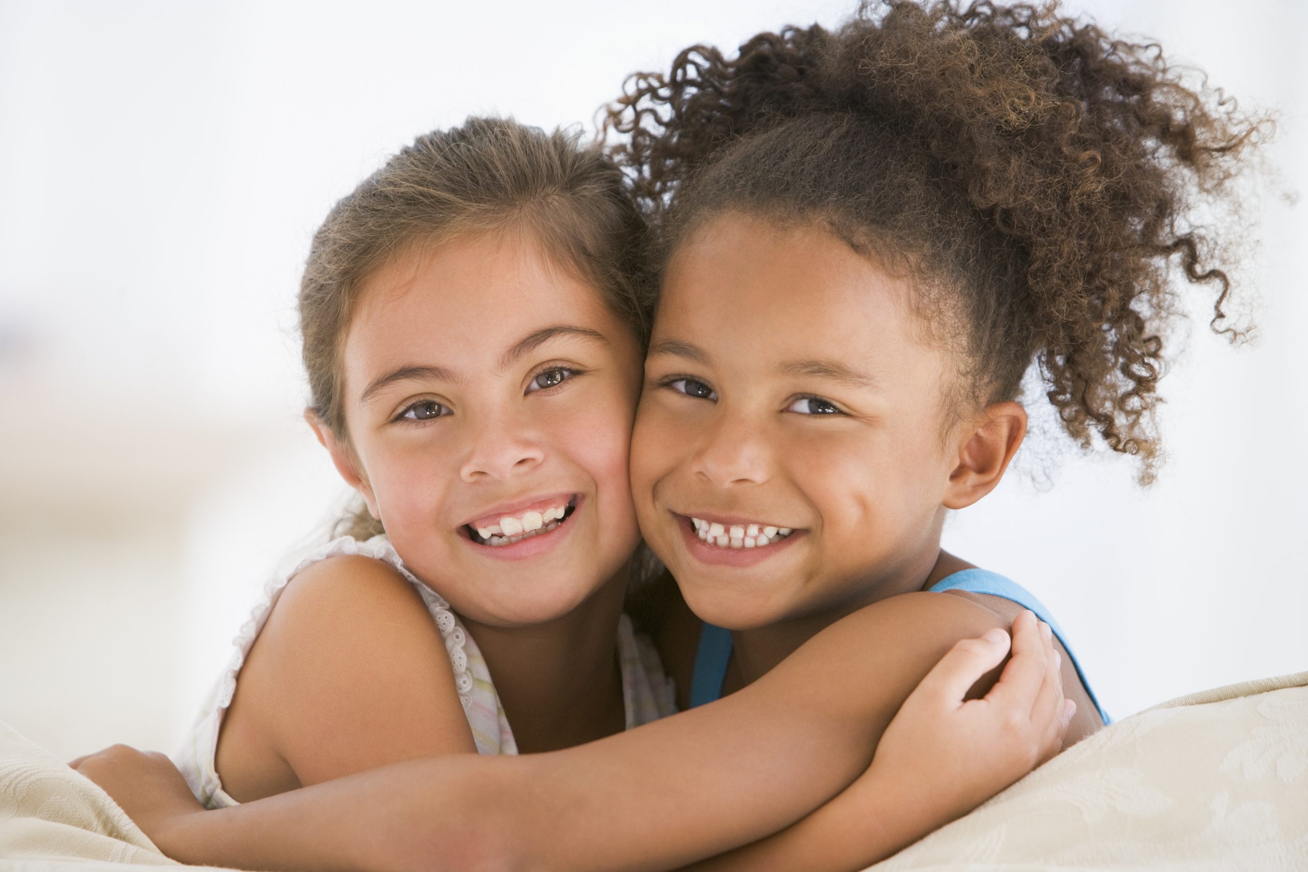 children hugging chiropractic approach